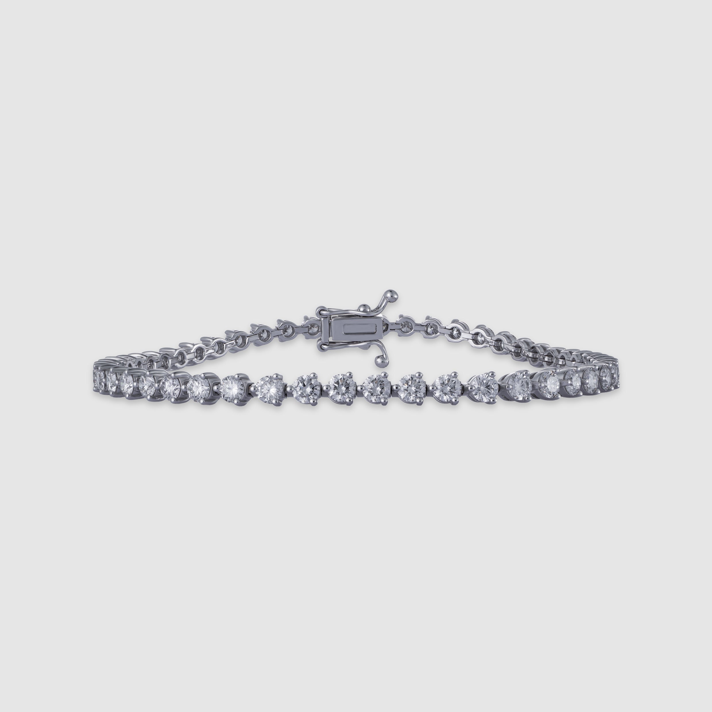 14K white gold three-prong diamond tennis bracelet