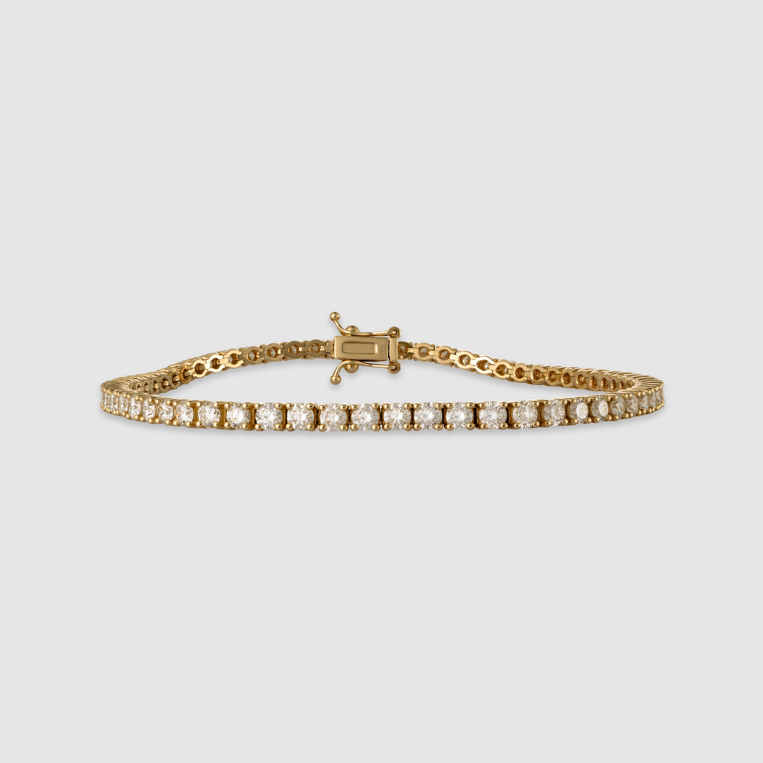 14K yellow gold four-prong diamond tennis bracelet