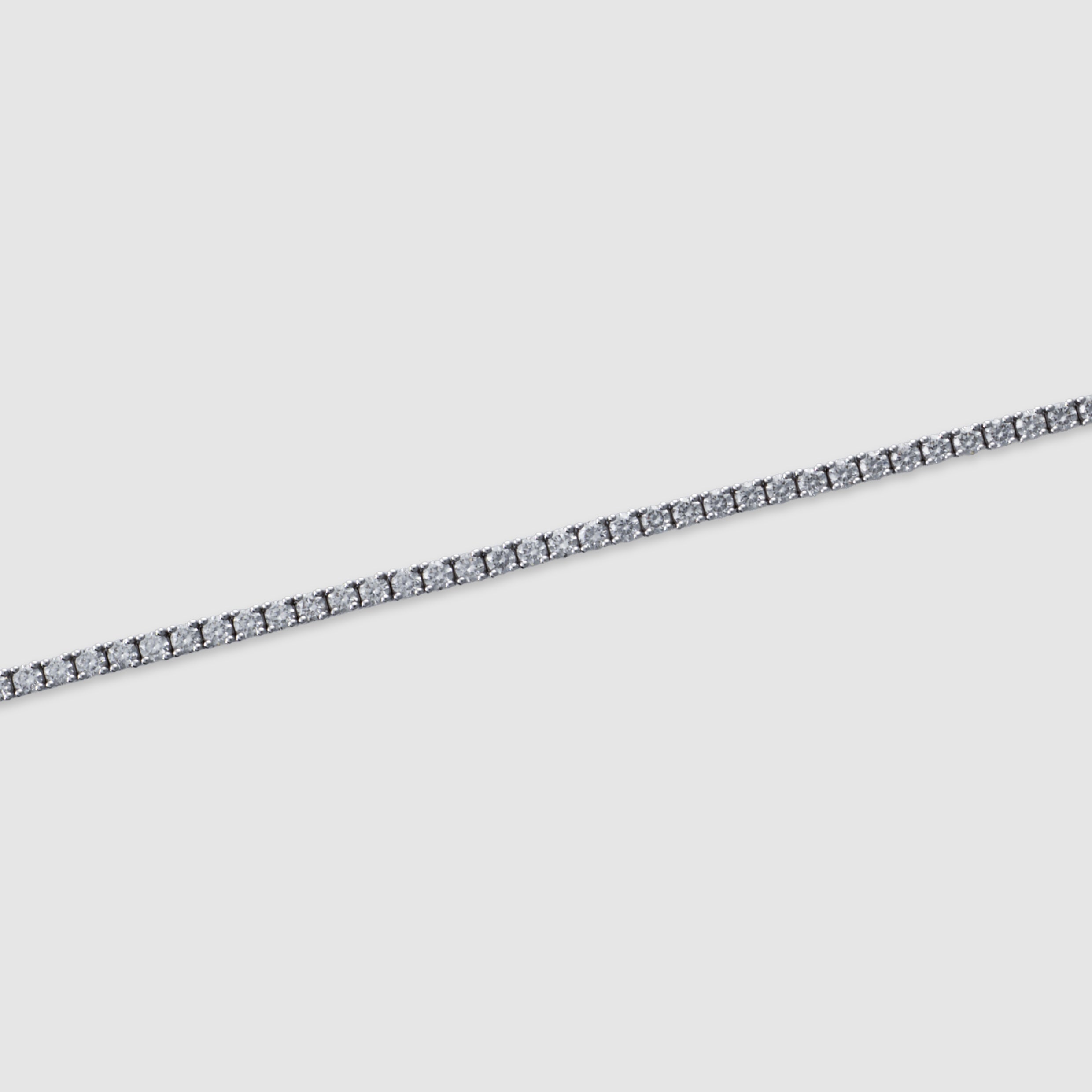 14K white gold four-prong diamond tennis bracelet