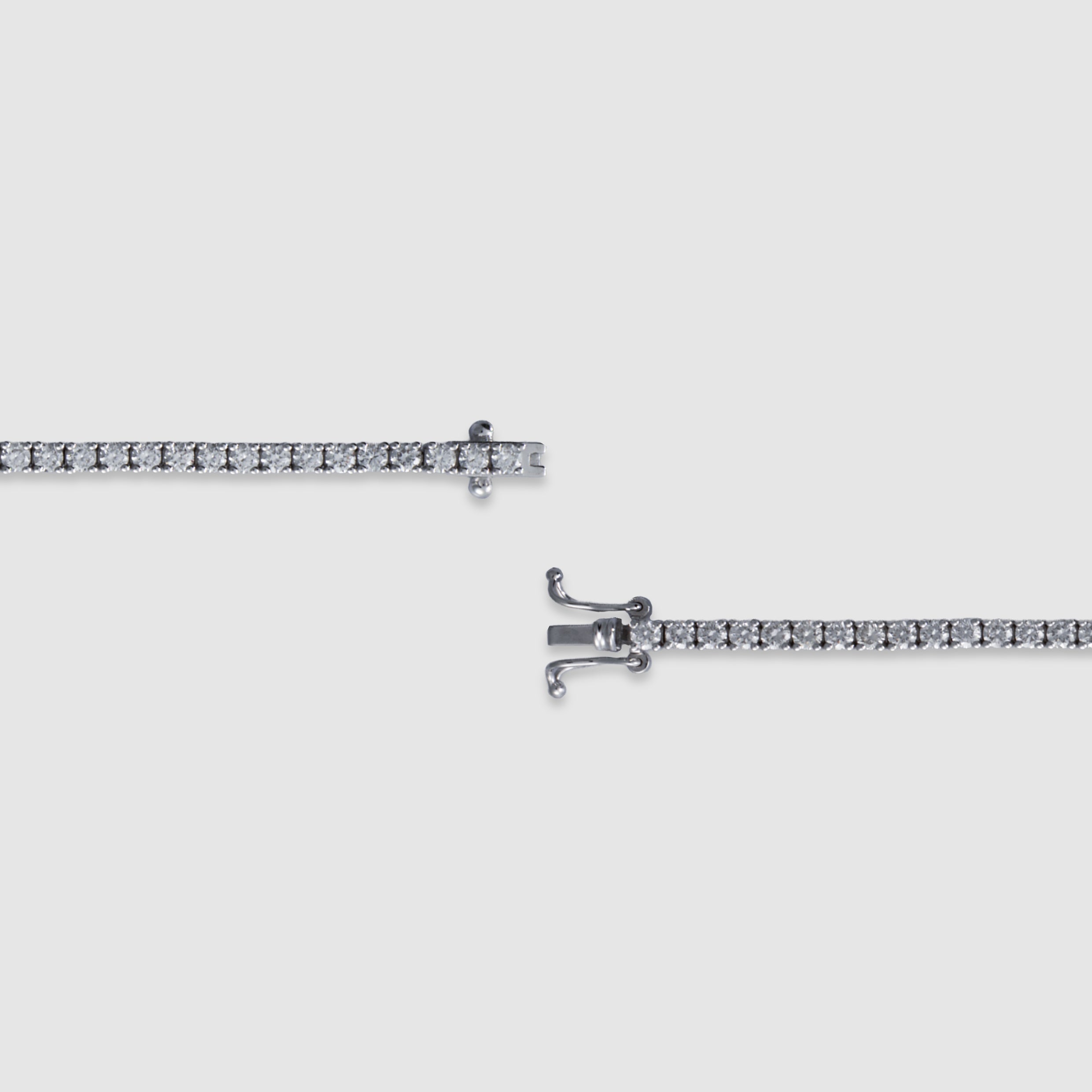 14K white gold four-prong diamond tennis bracelet