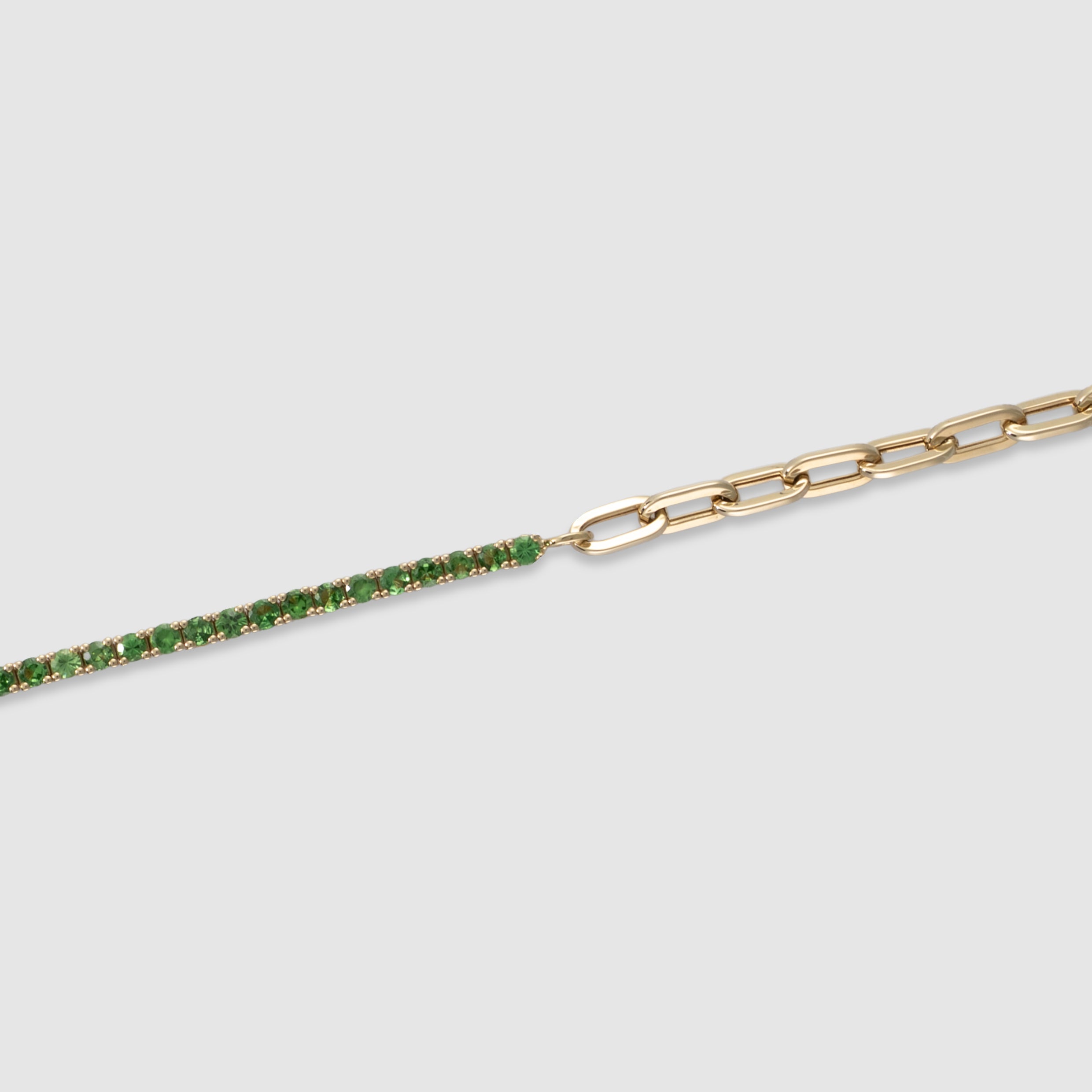 14K yellow gold four-prong green garnet half tennis bracelet