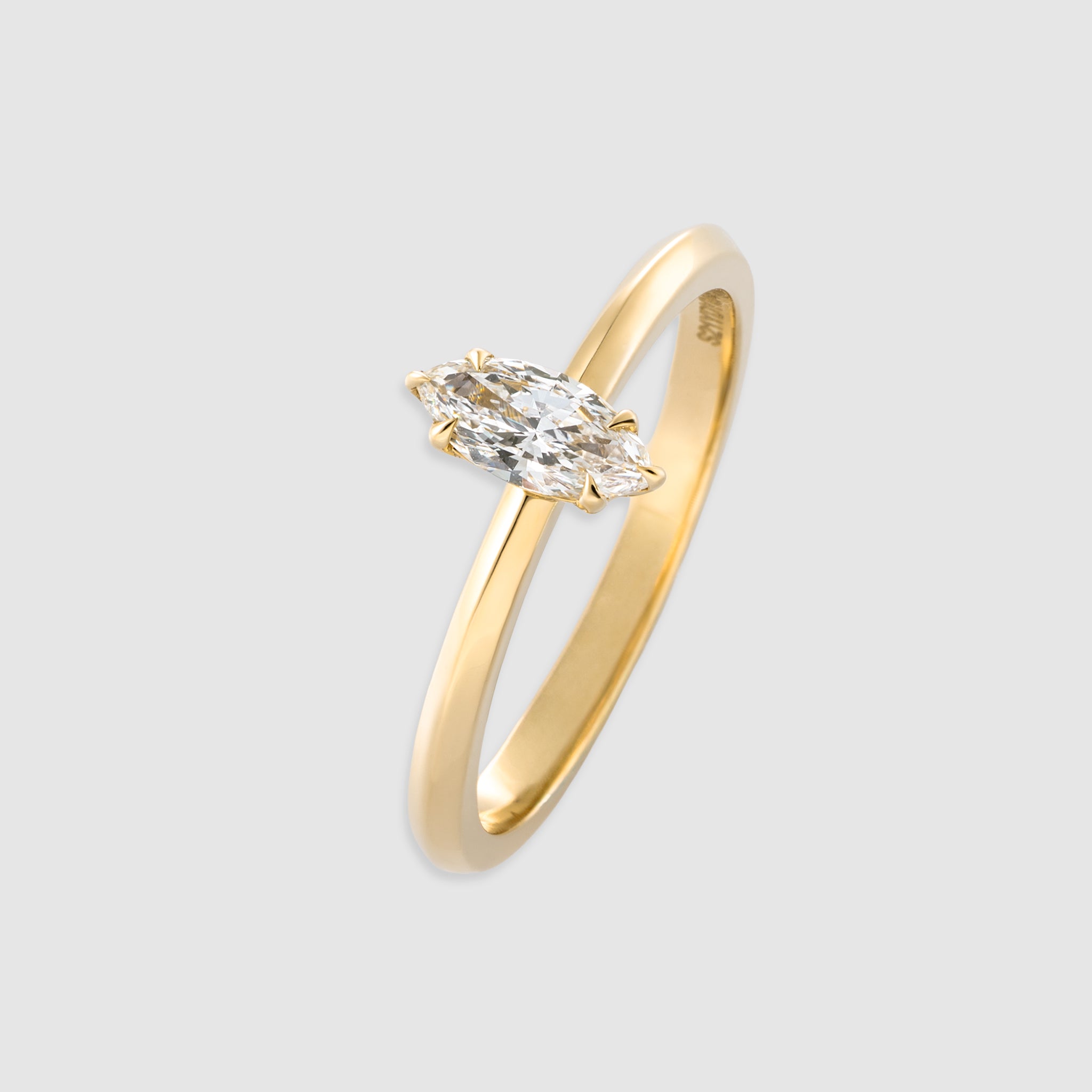 14K yellow gold marquise cut diamond solitaire ring