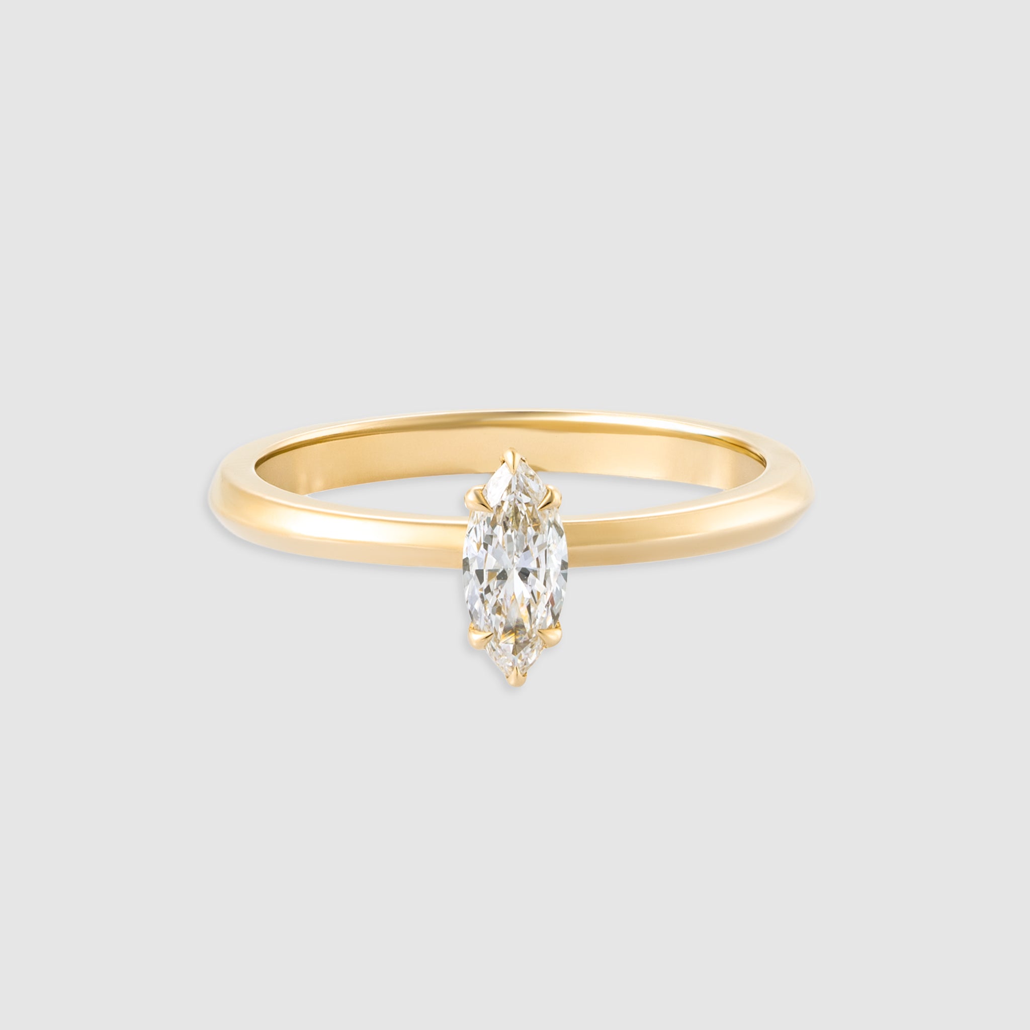 14K yellow gold marquise cut diamond solitaire ring