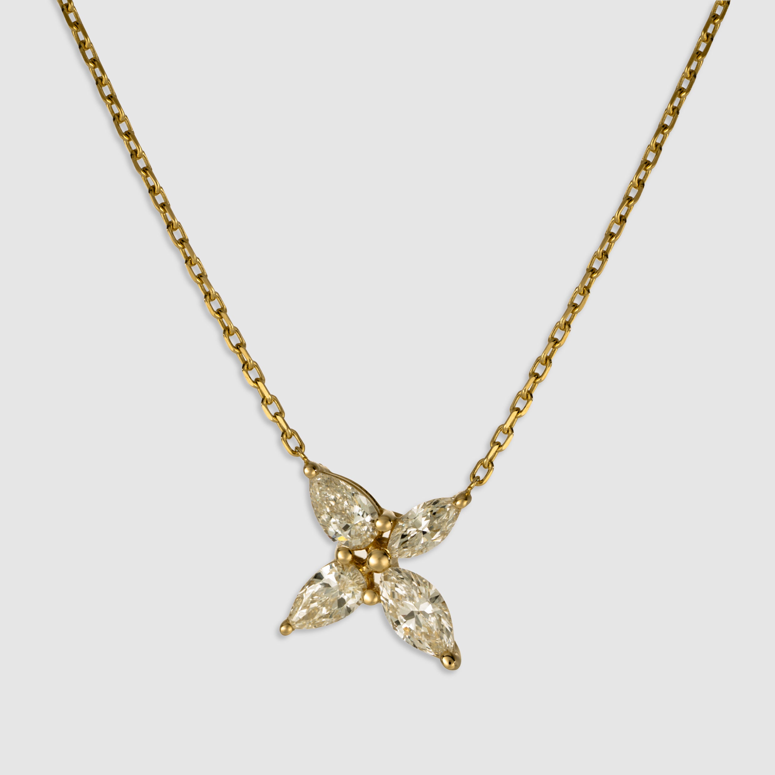 14K yellow gold marquise and pear cut diamond flower pendant necklace