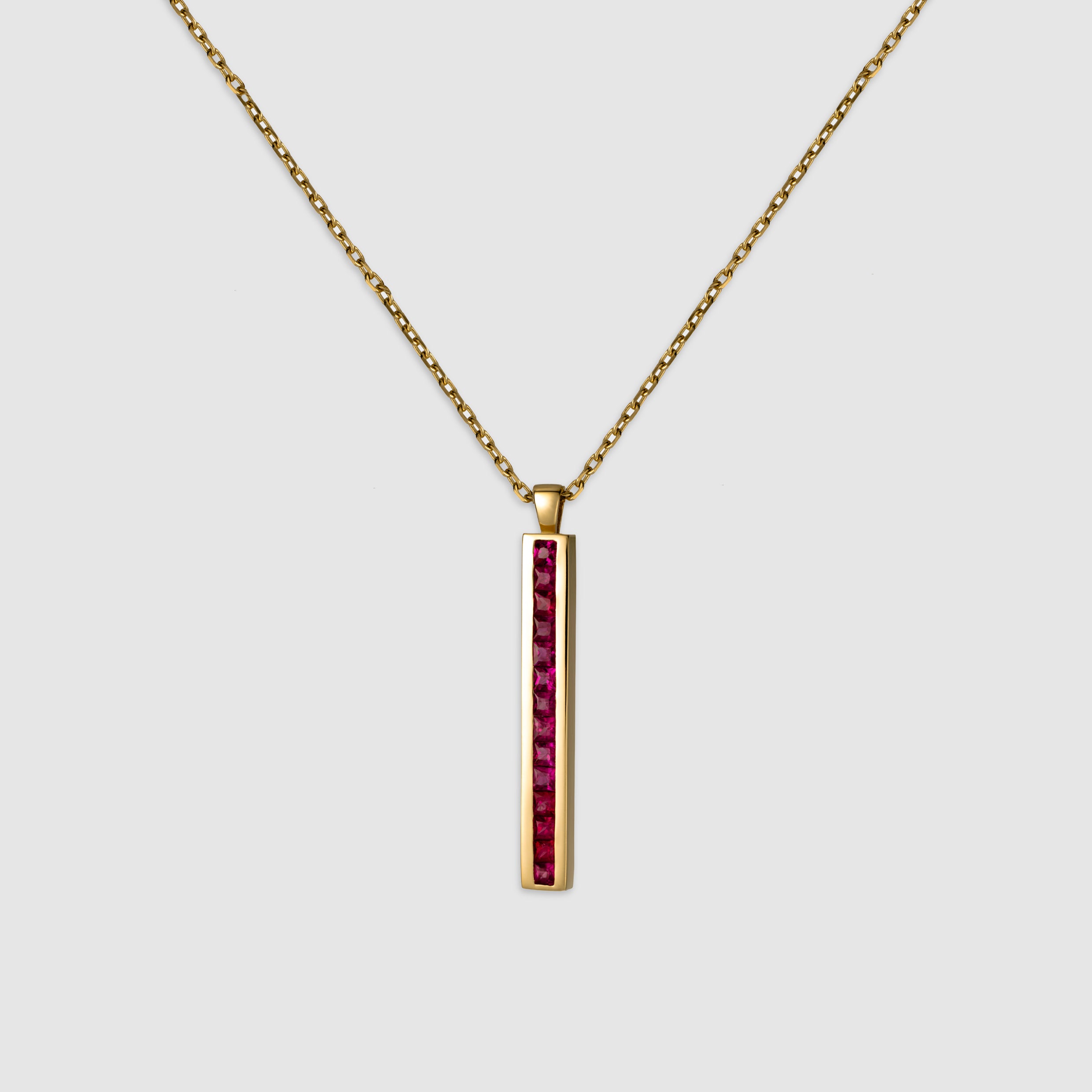 14K yellow gold princess cut ruby bar necklace