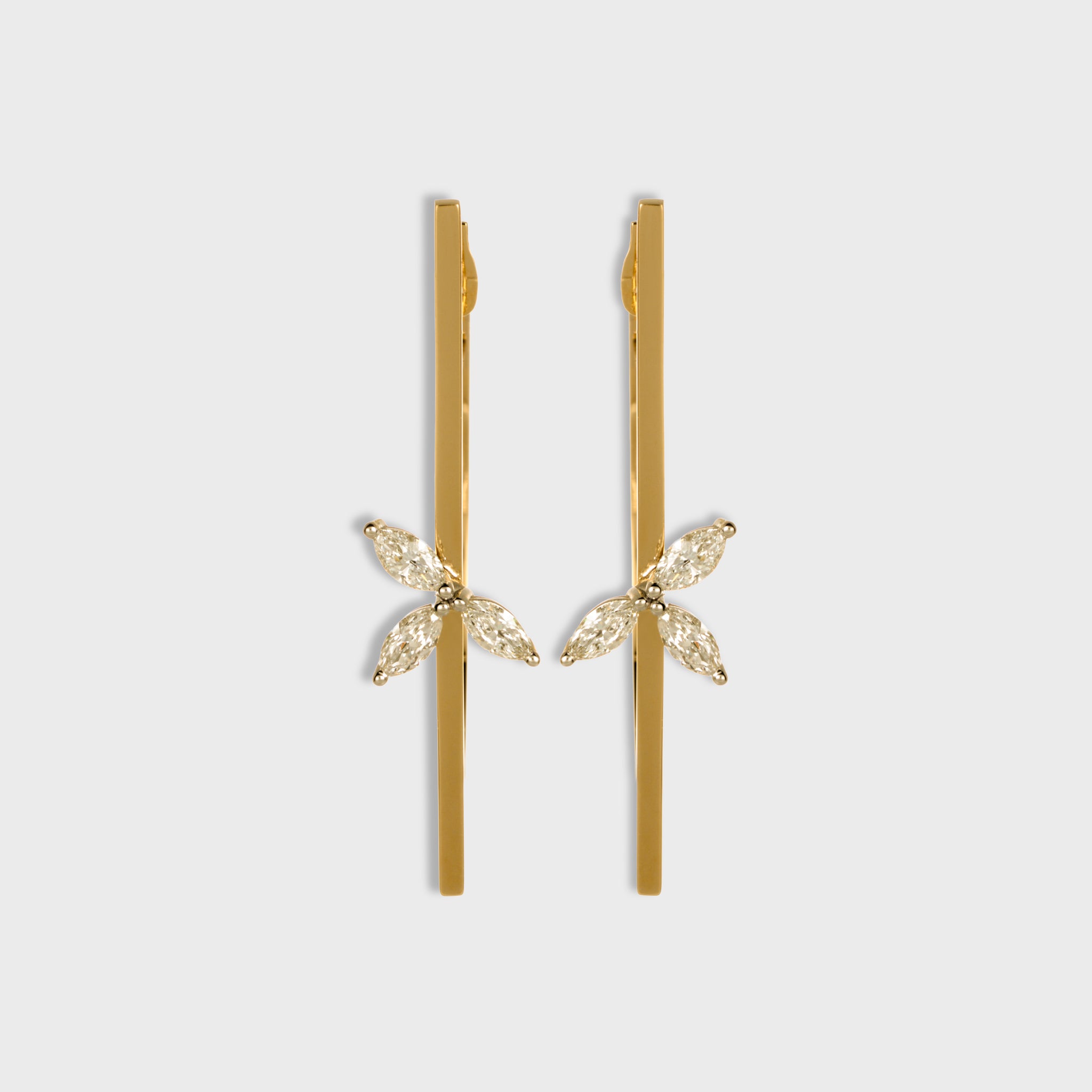 14K yellow gold horizontal bar earrings with three marquise cut diamonds each