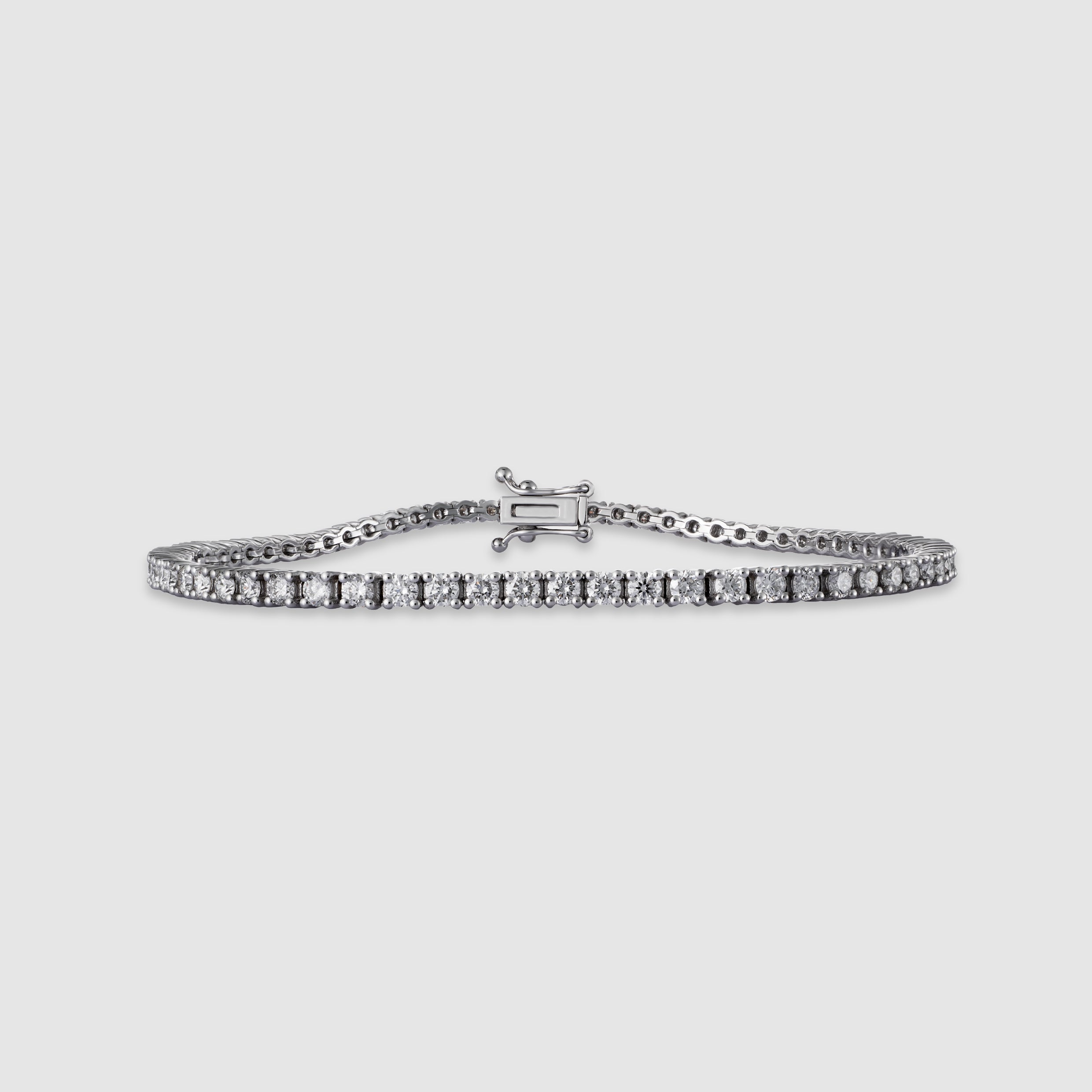 14K white gold four-prong diamond tennis bracelet