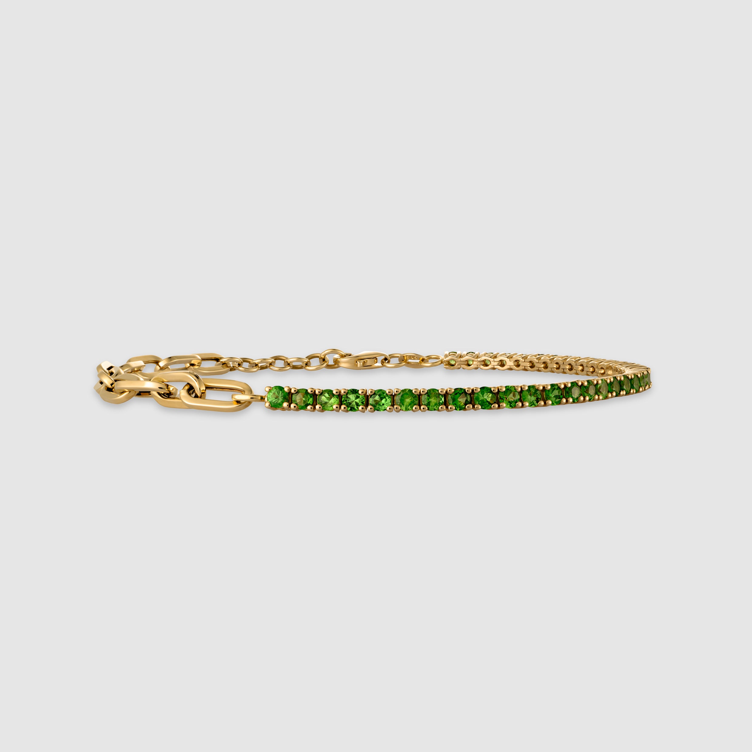 14K yellow gold four-prong green garnet half tennis bracelet