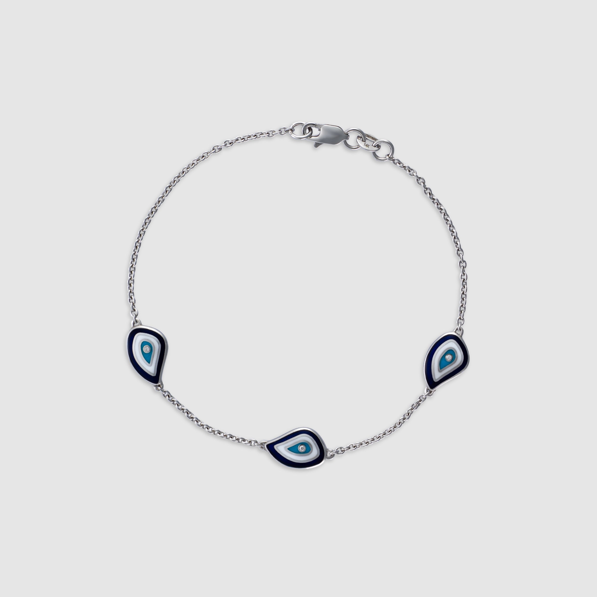 14K white gold bracelet with diamond evil eye charms