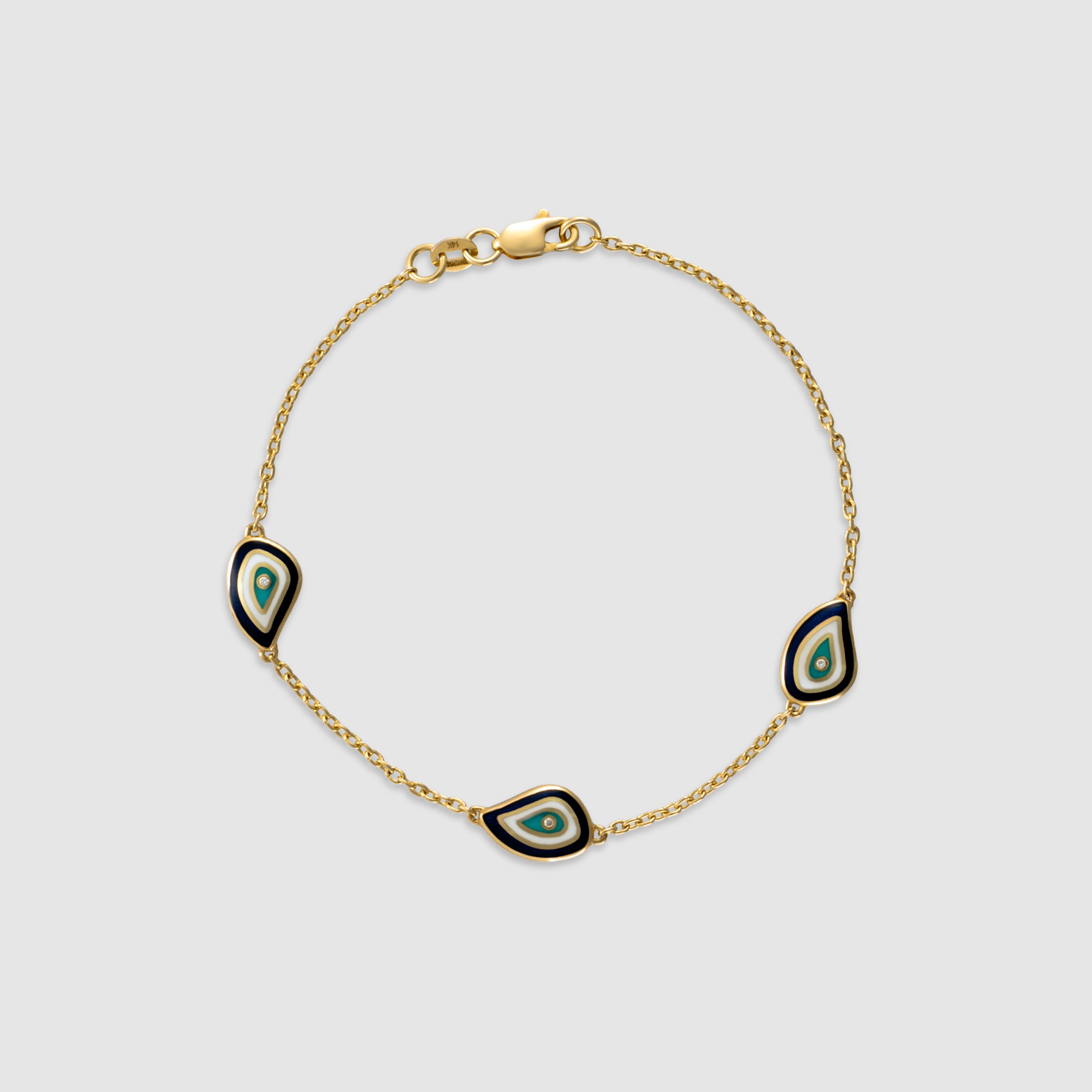 14K yellow gold bracelet with diamond evil eye charms
