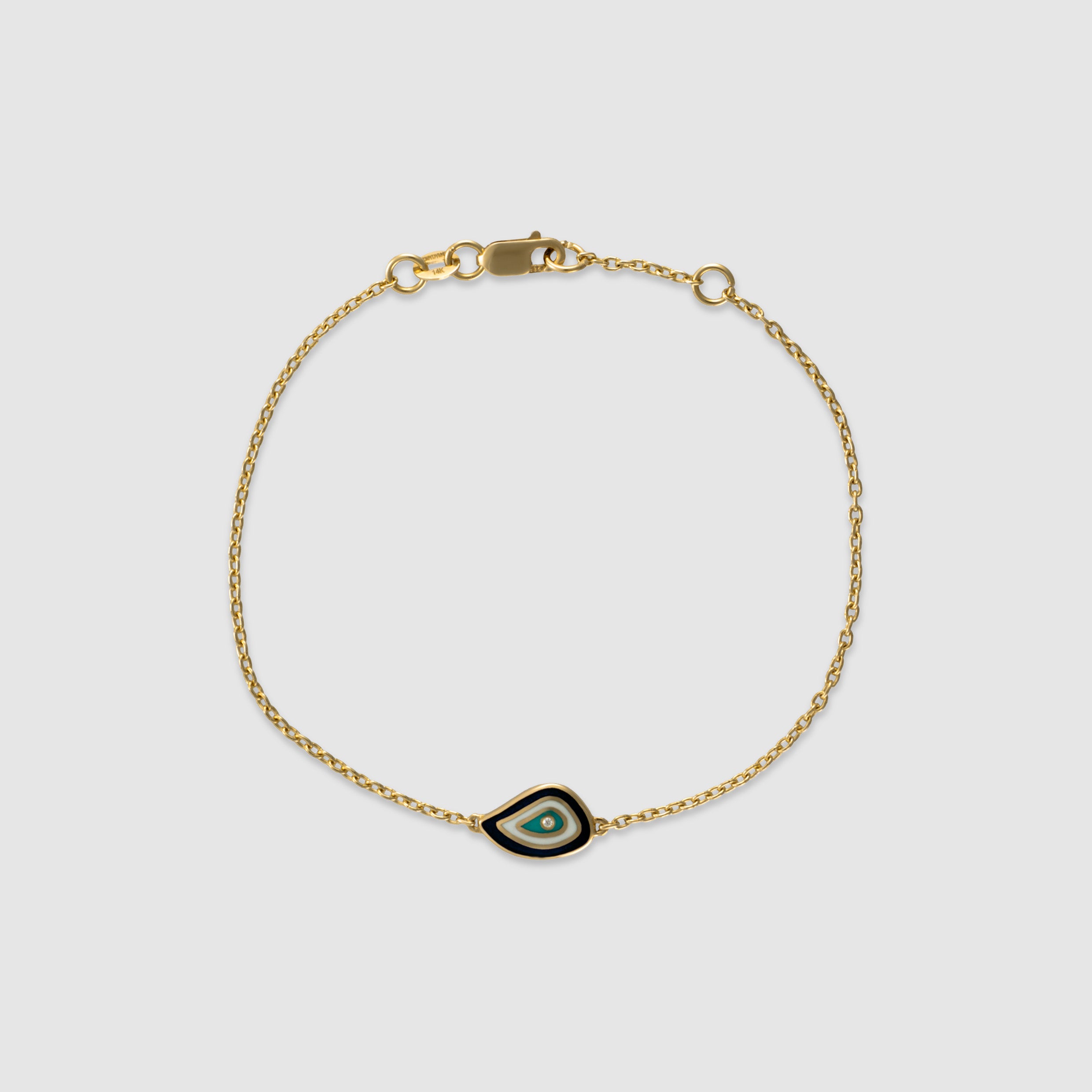 14K yellow gold bracelet with a diamond evil eye charm