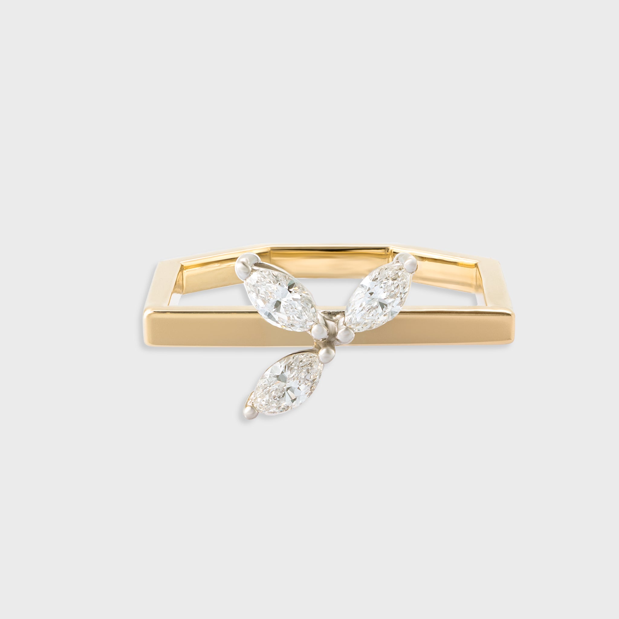 14K yellow gold hexagon ring with three marquise cut diamonds