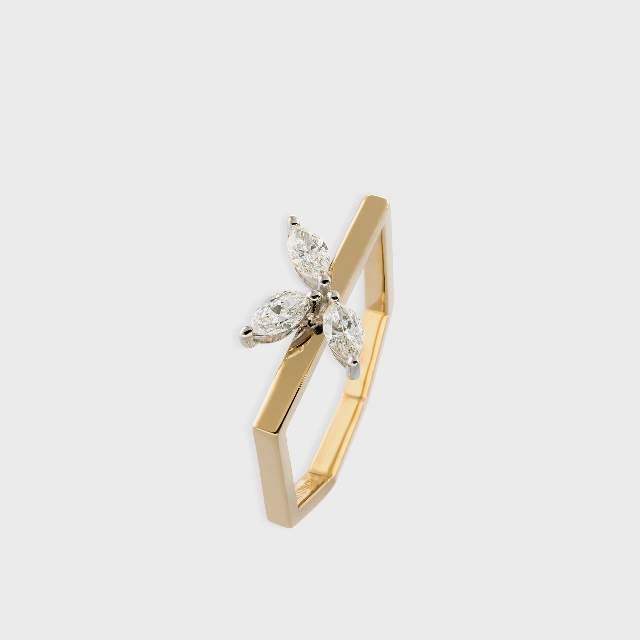 14K yellow gold hexagon ring with three marquise cut diamonds