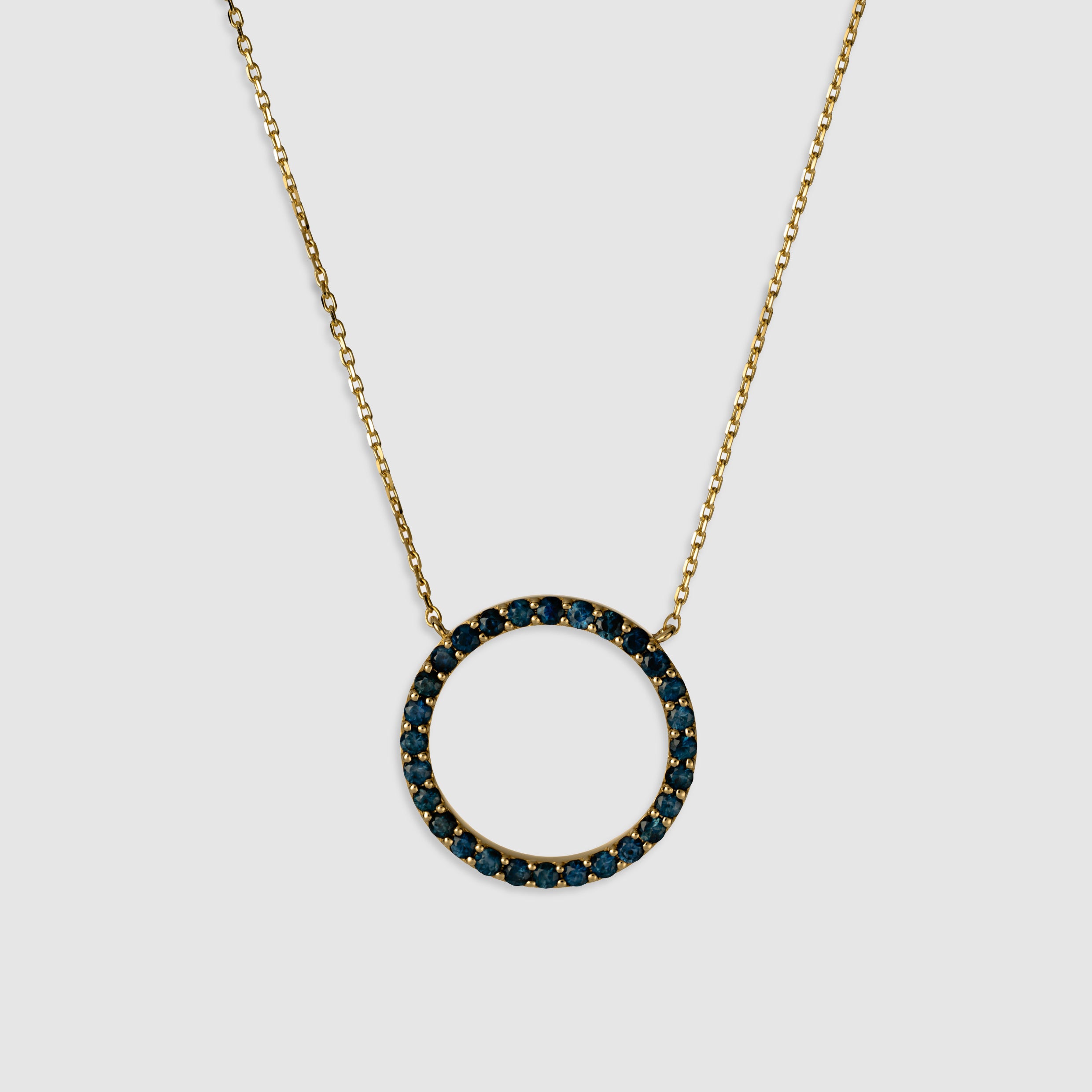 14K yellow gold princess cut blue sapphire circular necklace