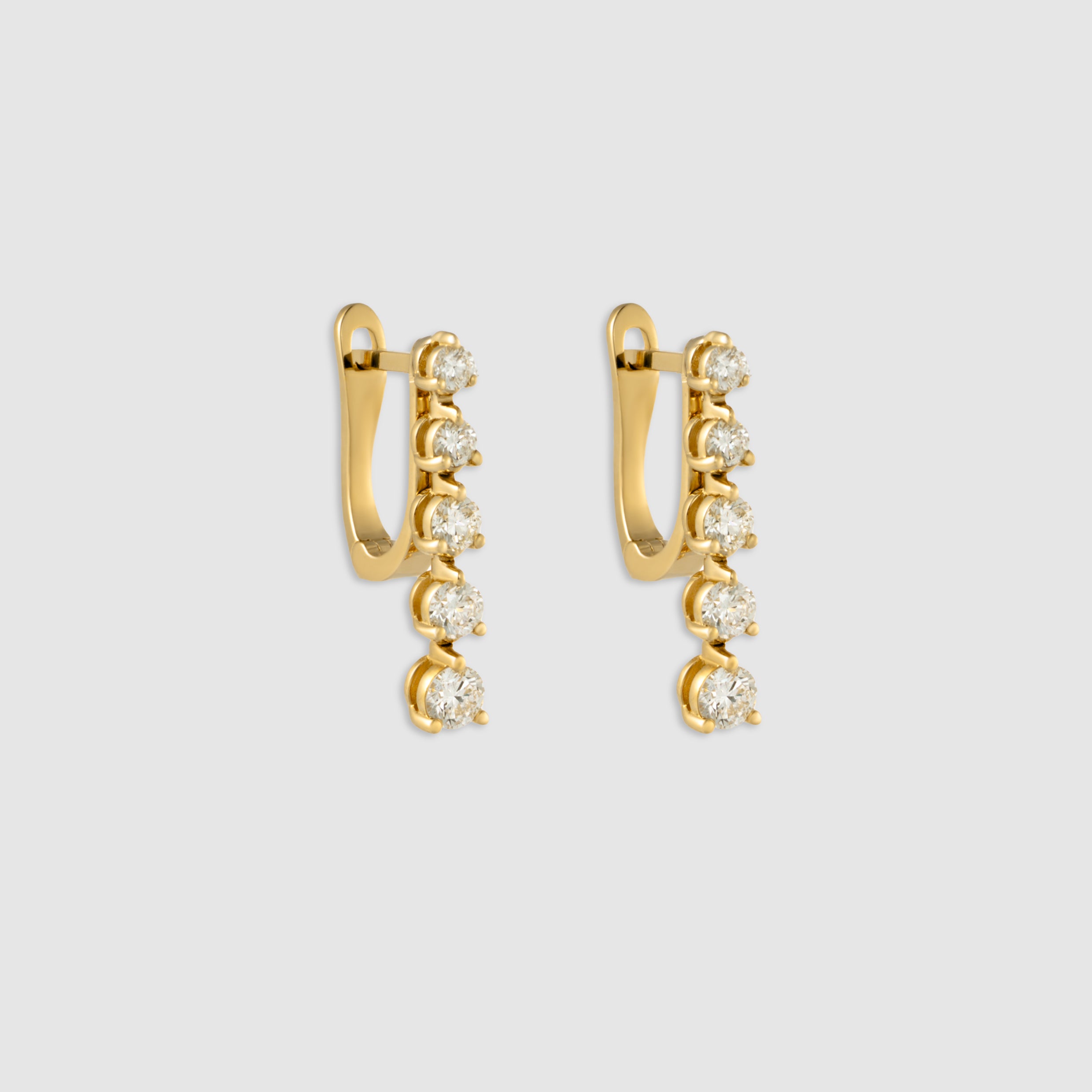 14K yellow gold five stone diamond drop earrings.