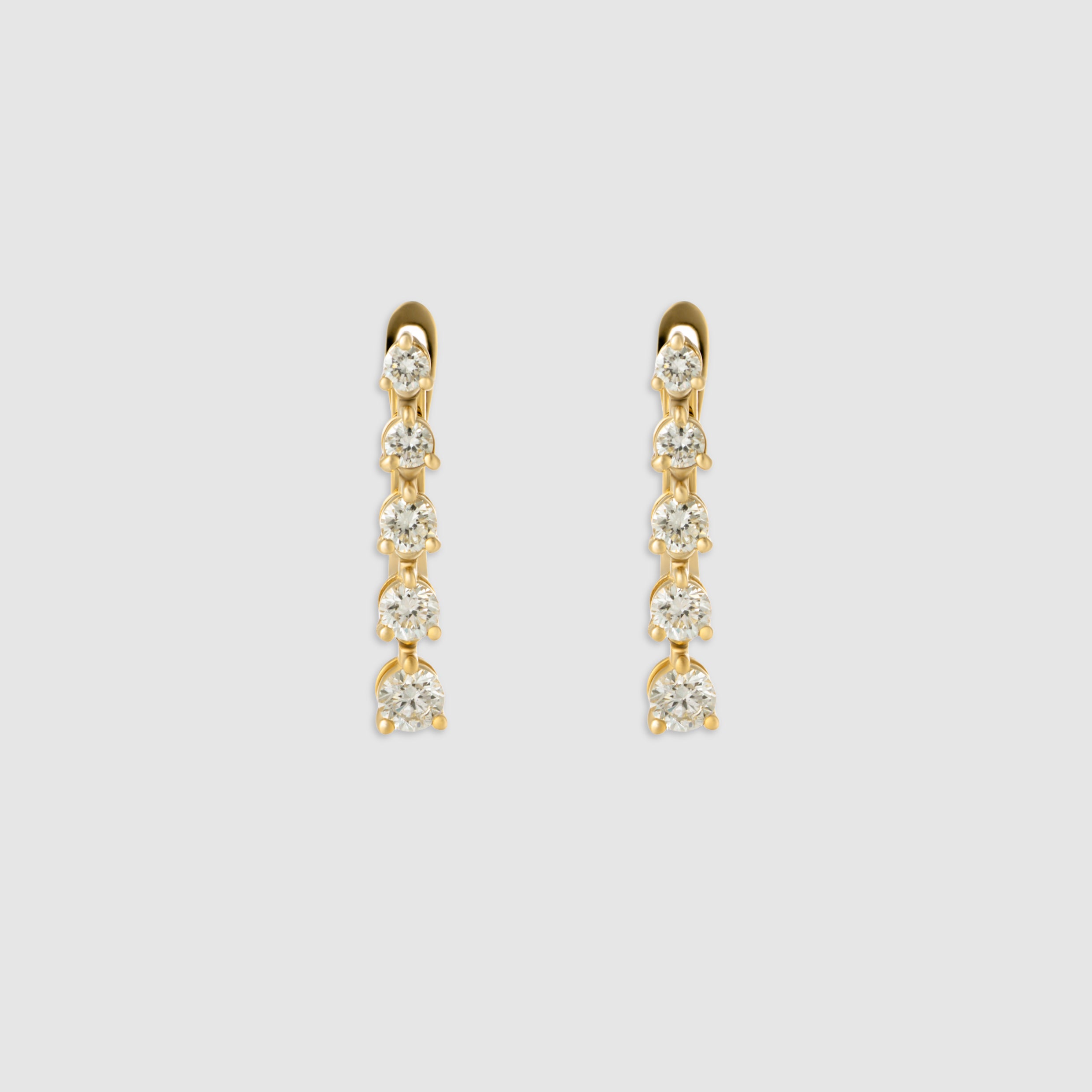 14K yellow gold five stone diamond drop earrings.